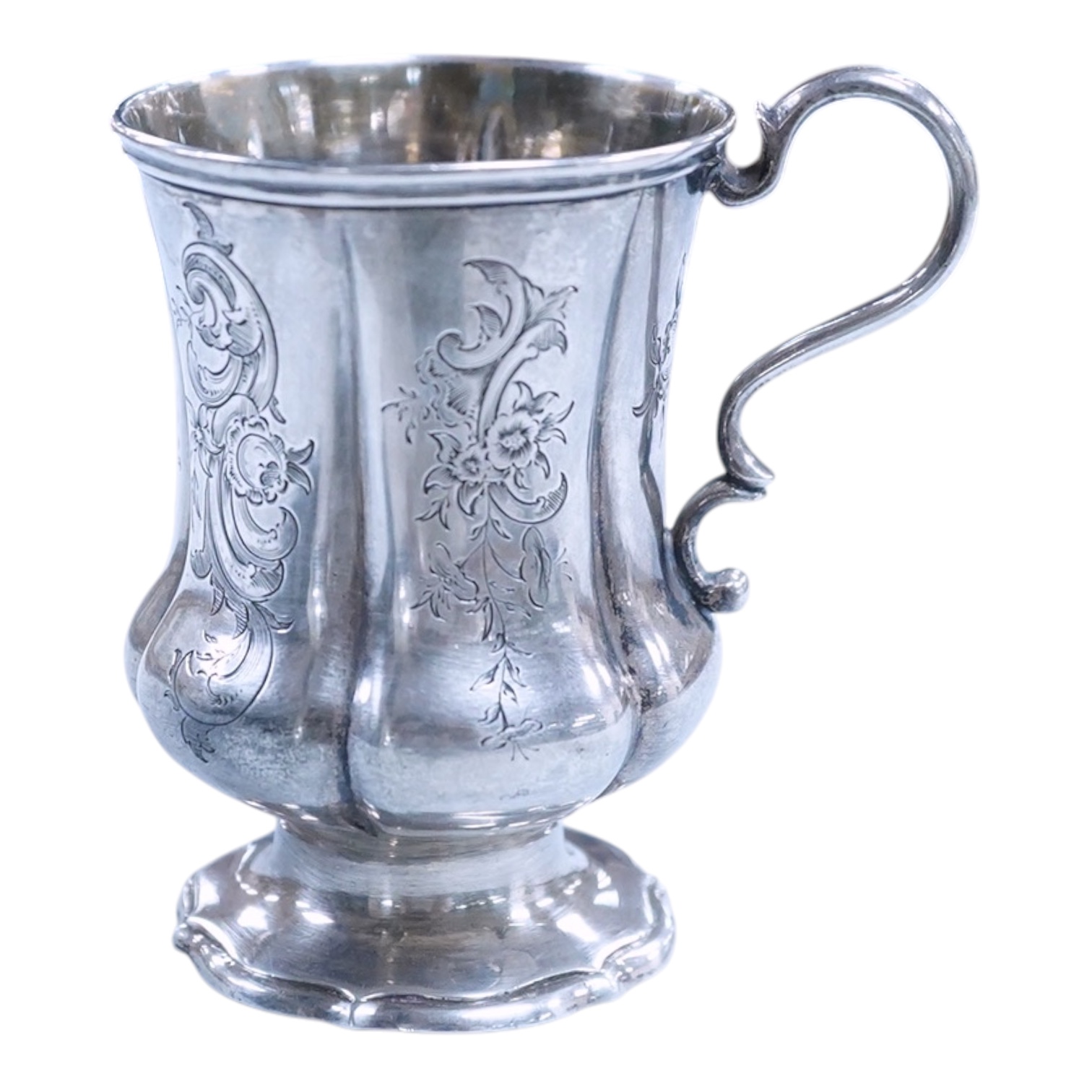 A Victorian engraved silver christening mug, on a pedestal foot, by Daniel & Charles Houle, London, 1848, 97mm, 4.4oz.